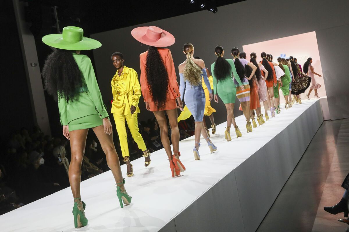 Fashion models walk the runway at the NYFW Fall/Winter 2022 Sergio Hudson fashion show at Spring Studios on Sunday, Feb. 13, 2022, in New York. (Photo by Andy Kropa/Invision/AP)