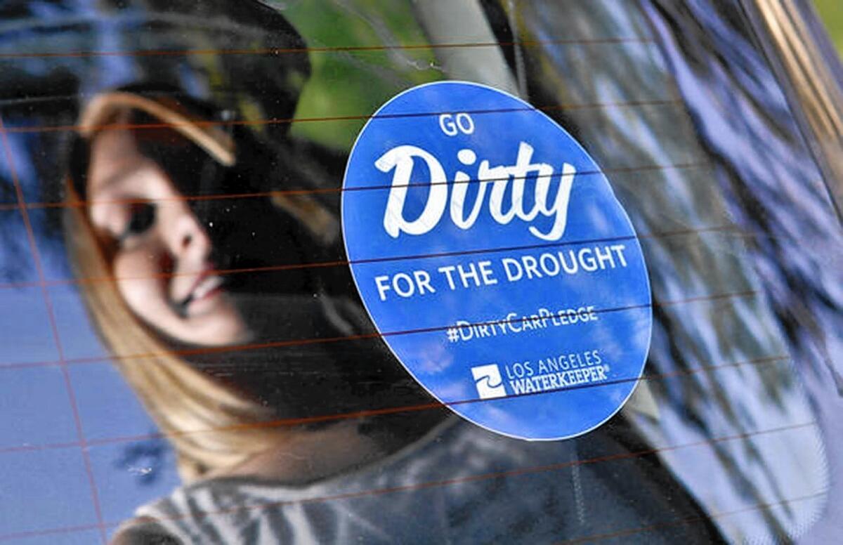 More than 300 Burbank city vehicles will go unwashed for at least two months as part of a new conservation program. City officials have requested that 350 blue stickers reading "Go Dirty for the Drought" be placed in car windows to bring attention to the state's historic dry spell.
