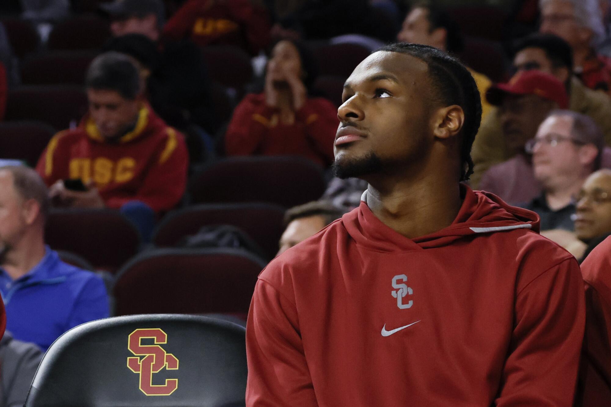 Bronny James sits on the bench during a game between USC and Eastern Washington in November.