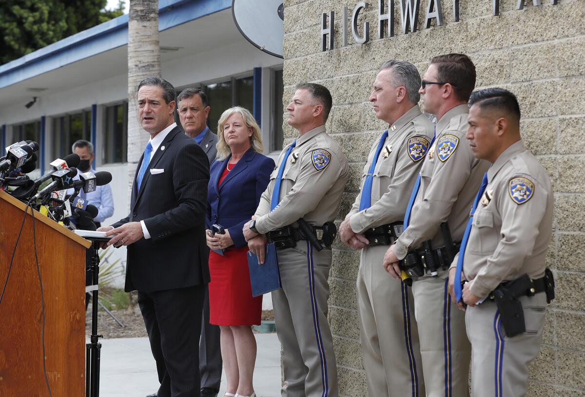 Orange County Dist. Atty. Todd Spitzer speaks during a press briefing on the two suspects arrested in the freeway shooting.