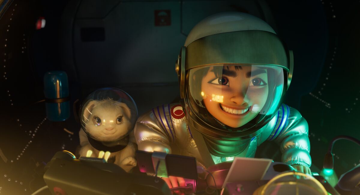 Fei Fei (voiced by Cathy Ang) and her pet rabbit, Bungee, in the movie "Over the Moon."