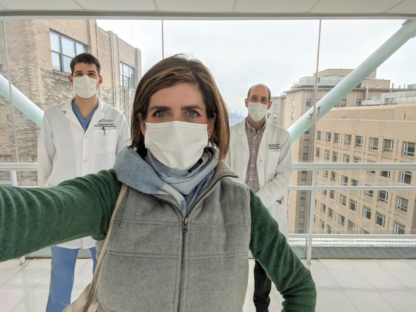 Diana Berrent of Survivor Corps with doctors at Columbia Presbyterian Hospital in New York.