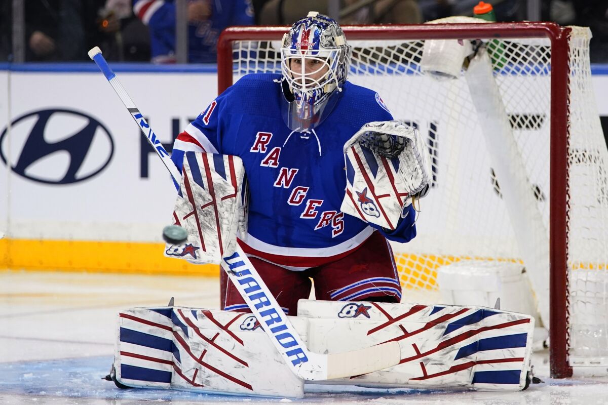 New York Rangers goaltender Igor Shesterkin (31) protects the net during the second period of the team's NHL hockey game against the New Jersey Devils on Friday, March 4, 2022, in New York. (AP Photo/Frank Franklin II)