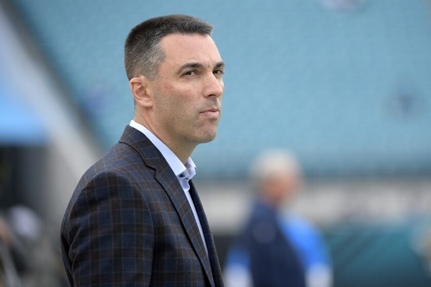 Los Angeles Chargers general manager Tom Telesco watches warmups on the field before an NFL football game against the Jacksonville Jaguars Sunday, Dec. 8, 2019, in Jacksonville, Fla. (AP Photo/Phelan M. Ebenhack)