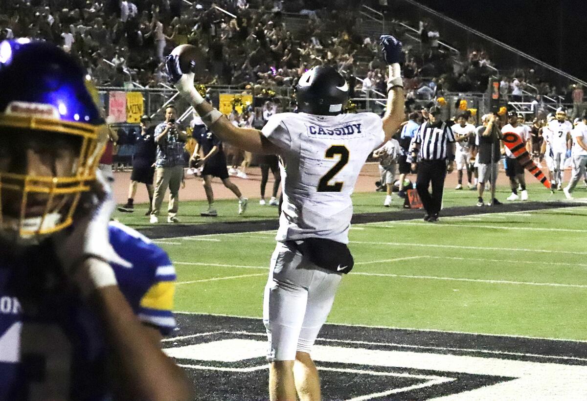 Marina's Shane Cassidy (2) celebrates after scoring a touchdown against Fountain Valley on Friday.