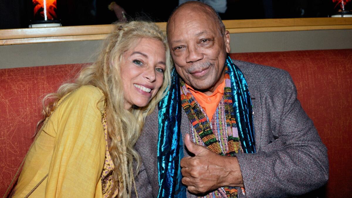 Jazz Foundation of America co-founder Wendy Oxenhorn, left, with event host Quincy Jones, right, at the Sunday fundraiser.