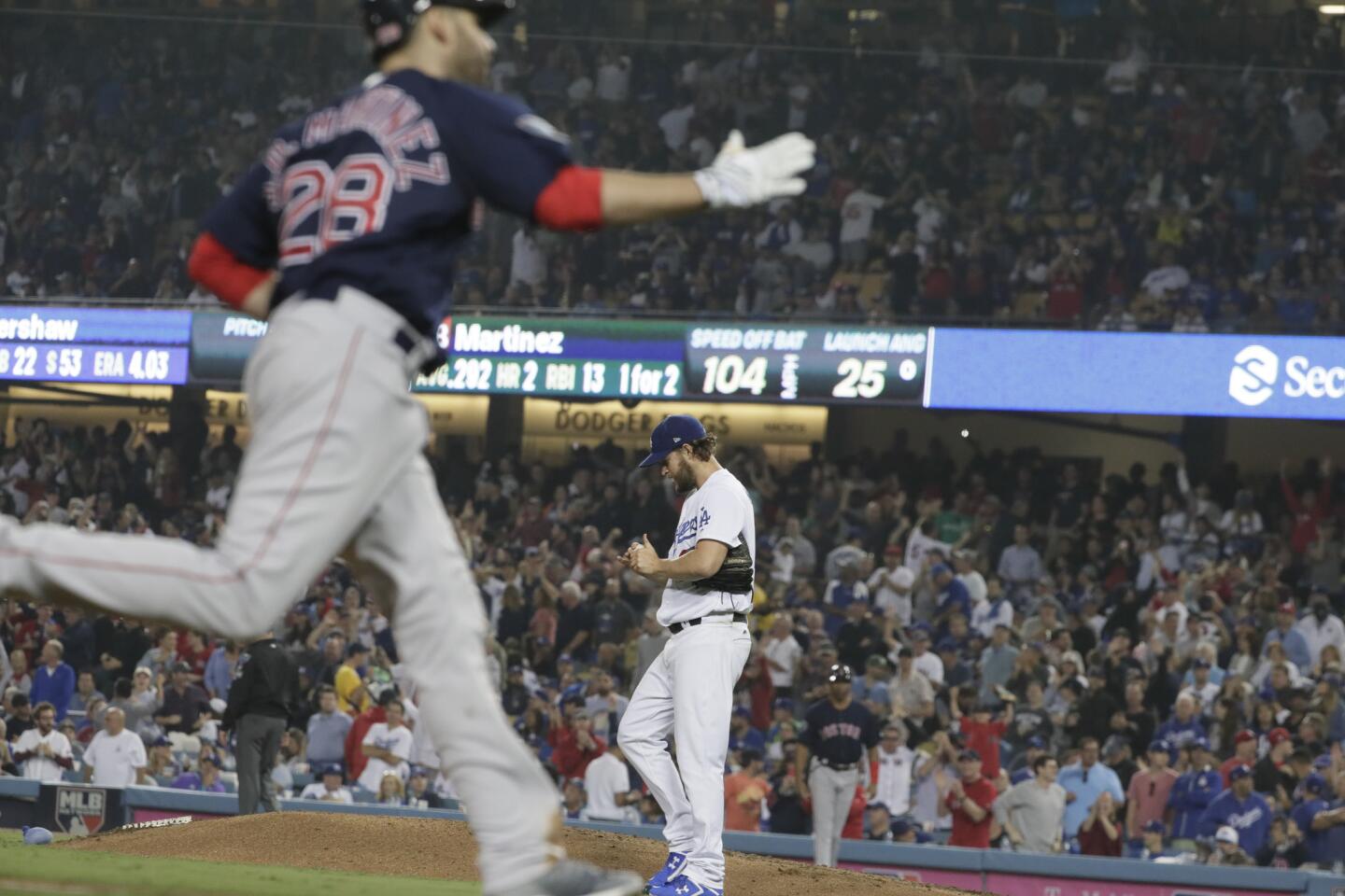 Dodgers pitcher Clayton Kershaw surrenders a home run to Red Sox right fielder J.D. Martinez.
