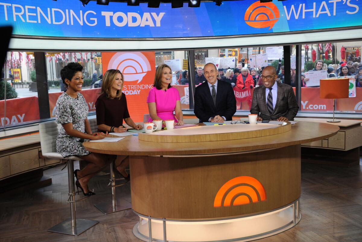From left, Tamron Hall, Natalie Morales, Savannah Guthrie, Matt Lauer and Al Roker appear on the "Today" show in New York on Nov. 3.