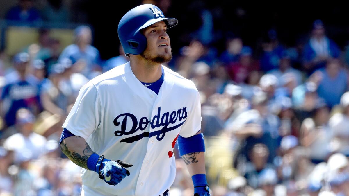 Yasmani Grandal, shown after hitting a home run on June 5, thinks the Dodgers need to play with more urgency.