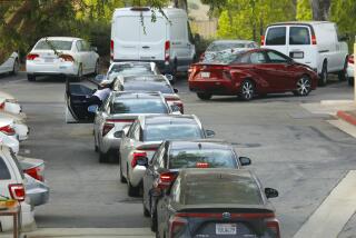 Los Angeles, California-June 28, 2021-Hydrogen powered cars line up at the South Coast Air Quality Management District - Diamond Bar hydrogen fuel station, where customers waited over two hours on June 28, 2021. (Carolyn Cole / Los Angeles Times)