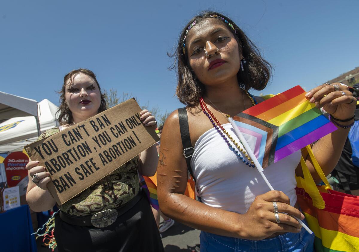 Two people at the OC Pride Festival