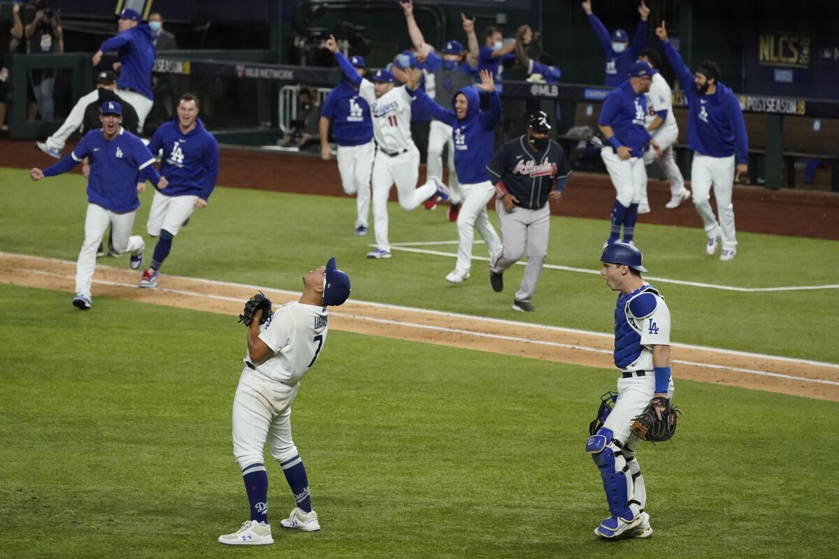 Los Angeles Dodgers pitcher Julio Urias celebrates their win.