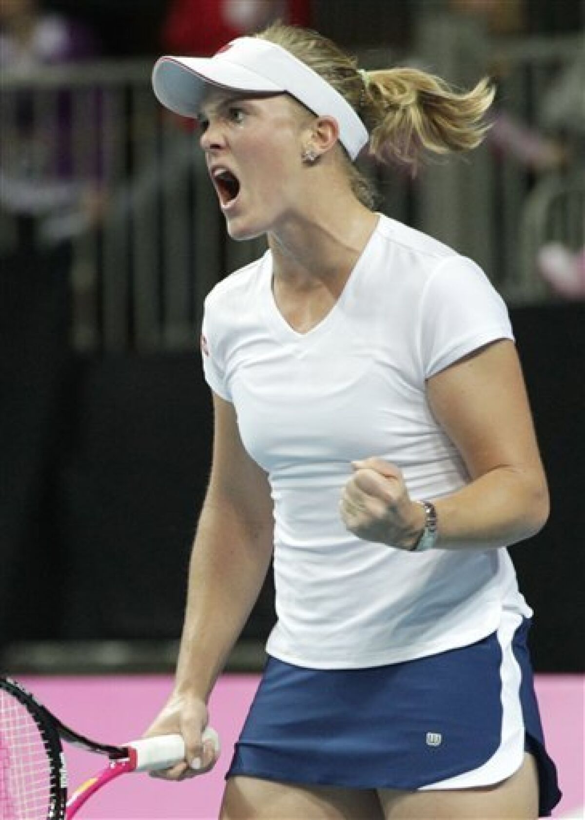 US player Melanie Oudin reacts during the World Group Fed Cup match against Belgium in Antwerp, Belgium, Saturday, Feb. 5, 2011. Belgium leads on the first day 2-0. (AP Photo/Yves Logghe)