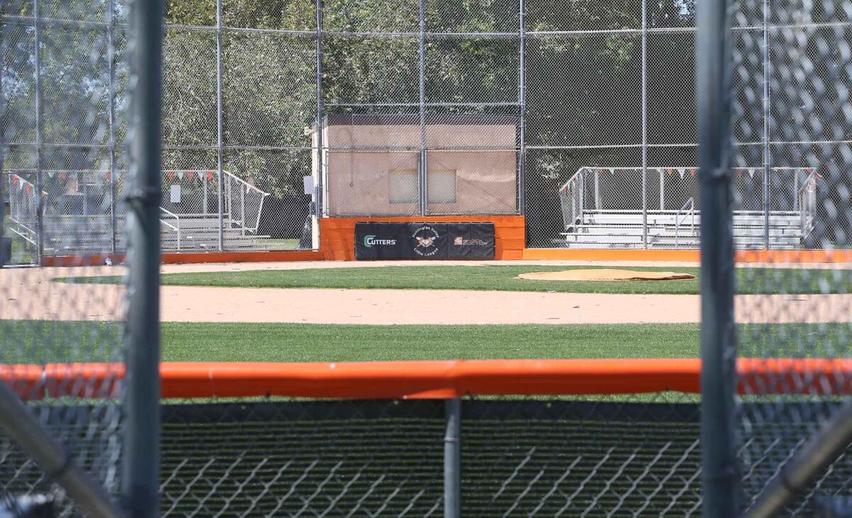 A Huntington Valley Little League field sits empty on Thursday in Huntington Beach. Little League International has recommended a suspension of all league activities through at least May 11.