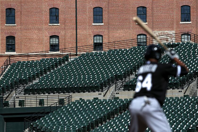 BALTIMORE, MD - APRIL 29: The stands are seen empty as Emilio Bonifacio #64 of the Chicago White Sox bats against the Baltimore Orioles at an empty Oriole Park at Camden Yards on April 29, 2015 in Baltimore, Maryland. Due to unrest in relation to the arrest and death of Freddie Gray, the two teams played in a stadium closed to the public. Gray, 25, was arrested for possessing a switch blade knife April 12 outside the Gilmor Houses housing project on Baltimore's west side. According to his attorney, Gray died a week later in the hospital from a severe spinal cord injury he received while in police custody. (Photo by Patrick Smith/Getty Images)