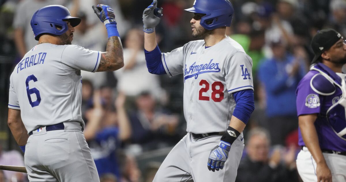 ‘They weren’t fazed.’ Dodgers come out swinging after weather delay to rout Rockies