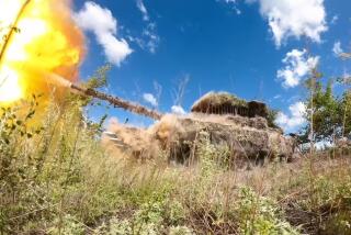 FILE -In this photo taken from video released by the Russian Defense Ministry on July 10, 2024, Russian tank T-80 of the grouping of troops "Center" fires towards Avdiivka direction from an undisclosed location. (Russian Defense Ministry Press Service photo via AP, File)