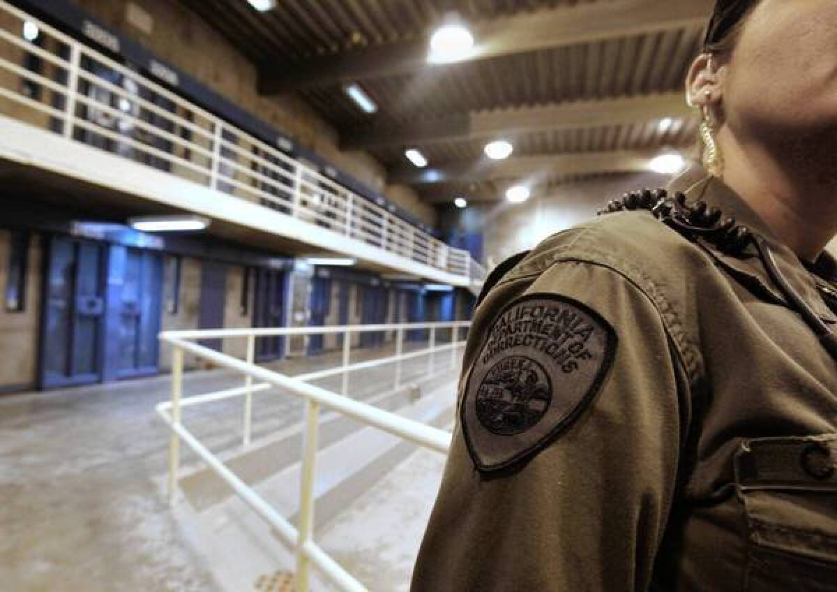 A corrections officer is seen in one of the housing units at Pelican Bay State Prison near Crescent City, Calif. A meal strike by thousands of state inmates originated at the high-security prison.
