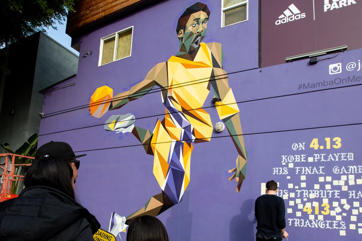 A mural features the image of Kobe Bryant made of all triangles outside of Shoe Palace on Melrose Avenue in Fairfax.