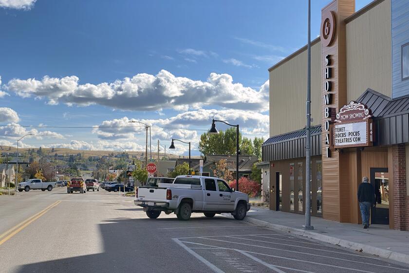 Main Street in Polson, Montana where Christopher Nolan’s film, “Tenet” is showing at the Showboat Theater. Showboat Cinemas movie theater in Polson, Montana is showing “Tenet” with social distancing requirements in place. Credit: Patricia Williams