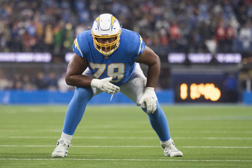 Los Angeles Chargers offensive tackle Trey Pipkins (79) gets ready for a snap during an NFL football game against the Kansas City Chiefs Thursday, Dec. 16, 2021, in Inglewood, Calif. (AP Photo/Kyusung Gong)