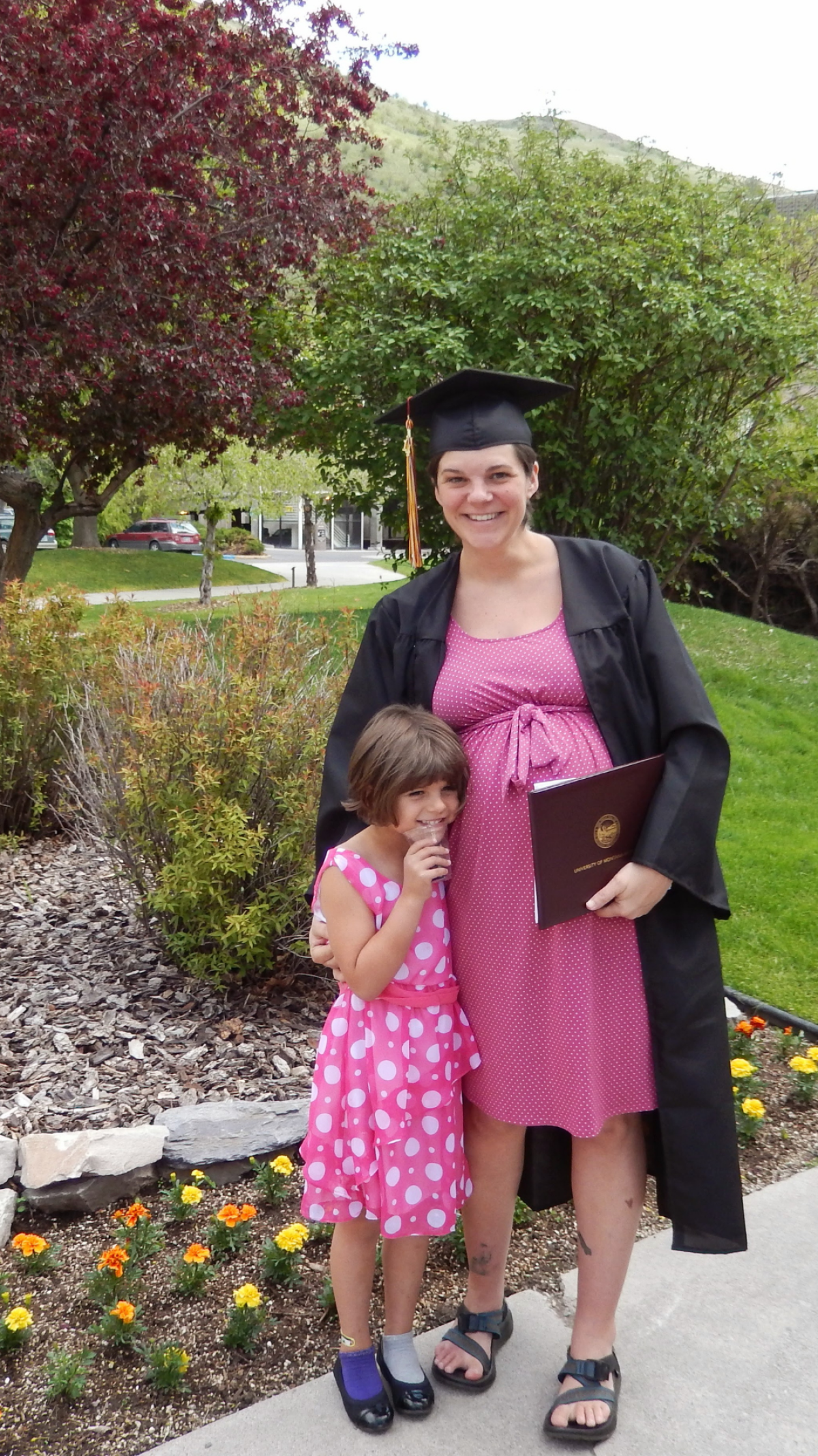 Stephanie Land on the day she graduated from the University of Montana, with her daughter 