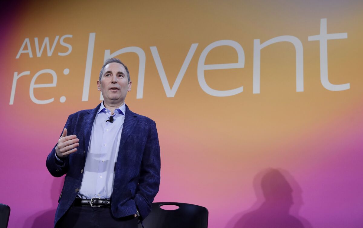 FILE - In this Dec. 5, 2019, file photo, AWS CEO Andy Jassy, discusses a new initiative with the NFL during AWS re:Invent 2019 in Las Vegas. In his first letter to Amazon shareholders, Jassy offered a defense of wages and benefits the company gives its warehouse workers while also vowing to improve injury rates inside the facilities. Jassy, who took over from Amazon founder Jeff Bezos as CEO last July, wrote the company has researched and created a list of the top 100 “employee experience pain points” and is working to solve them. A report released this week by a coalition of four labor unions found Amazon employed 33% of all U.S. warehouse workers in 2021, but was responsible for 49% of all injuries in the industry. (Isaac Brekken/AP Images for NFL, File)