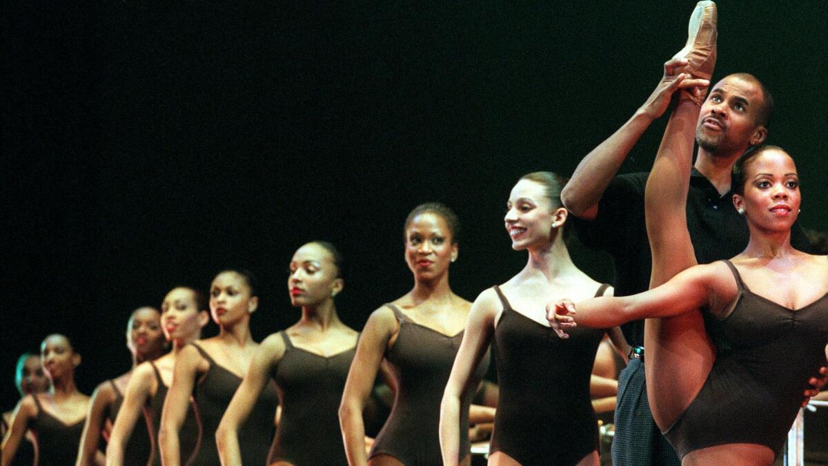 The Dance Theatre of Harlem gives a "Dancing Through Barriers" demonstration in 2000 for thousands of Los Angeles high school students.
