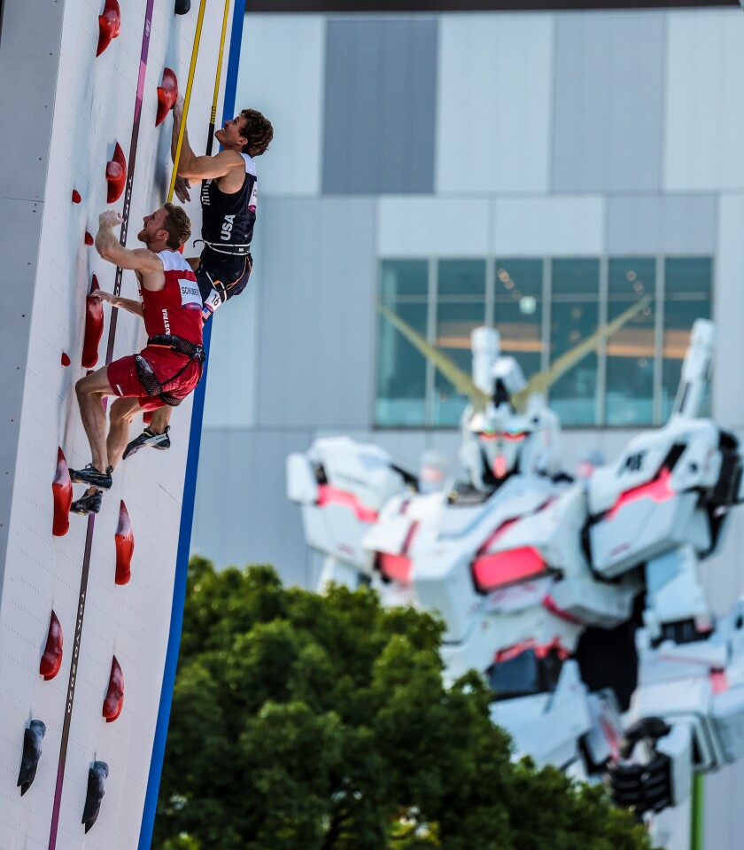 U.S. climber Nathaniel Coleman, right, climbs against Austria's Jakob Schubert