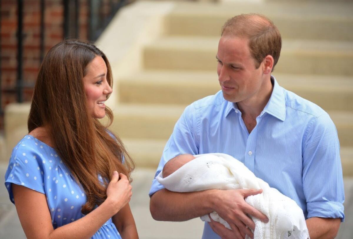 Catherine, the Duchess of Cambridge, and Prince William introduce their newborn son to the media outside St. Mary's Hospital in London on Tuesday.