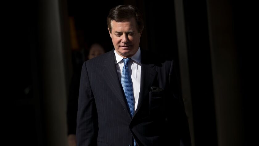 Paul Manafort, President Trump's former campaign manager, leaves the federal courthouse in Washington.