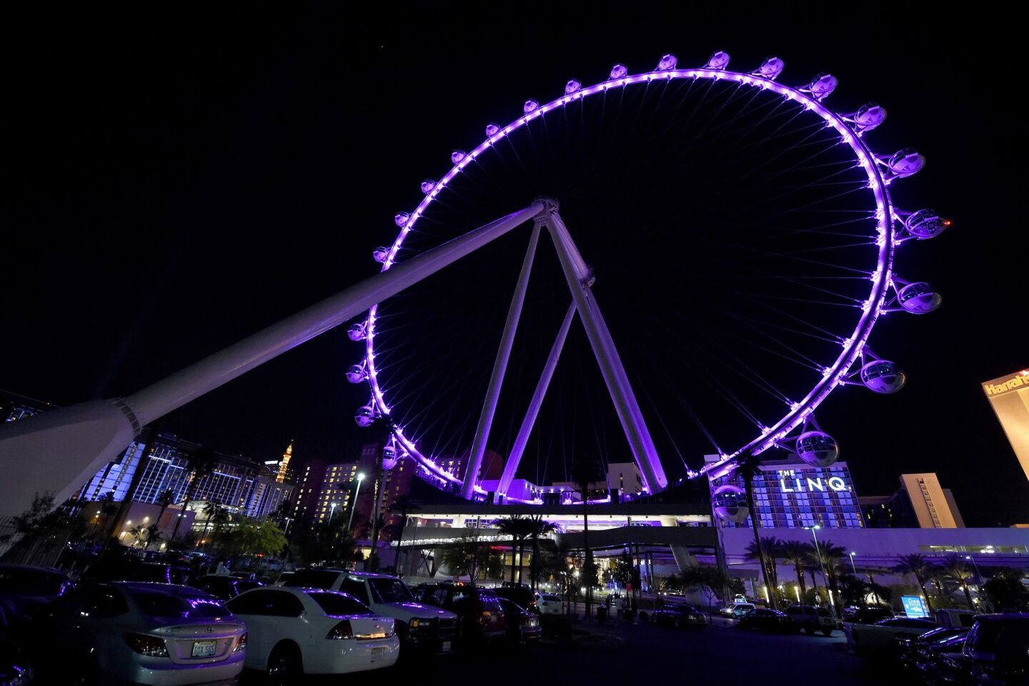 The High Roller at The LINQ Promenade on the Las Vegas Strip is lit with purple lights in memory Prince.
