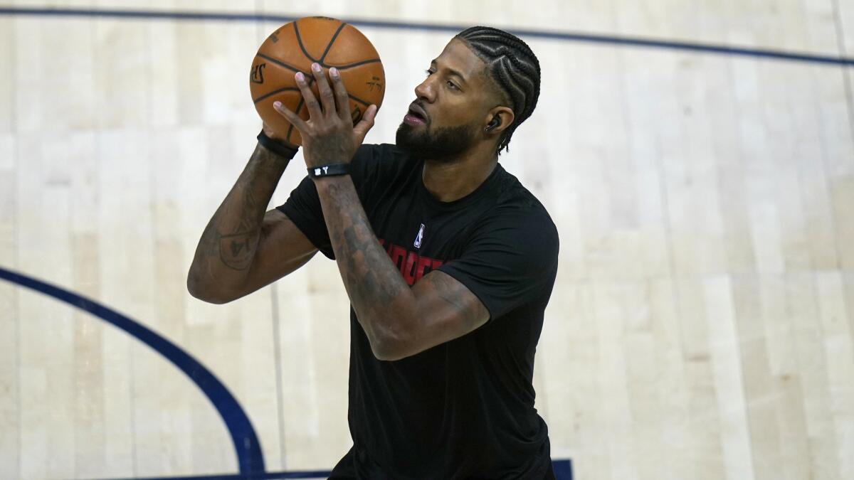 Paul George warms up before a Clippers game on Jan. 1, 2021, in Salt Lake City.