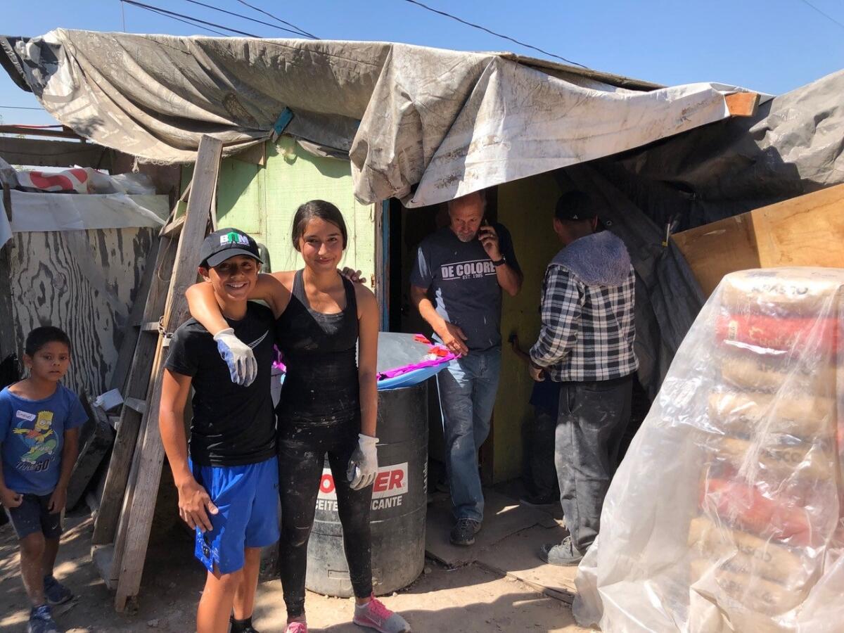 Gabriel and Daniella Benitez at work on a recent Build a Miracle project.