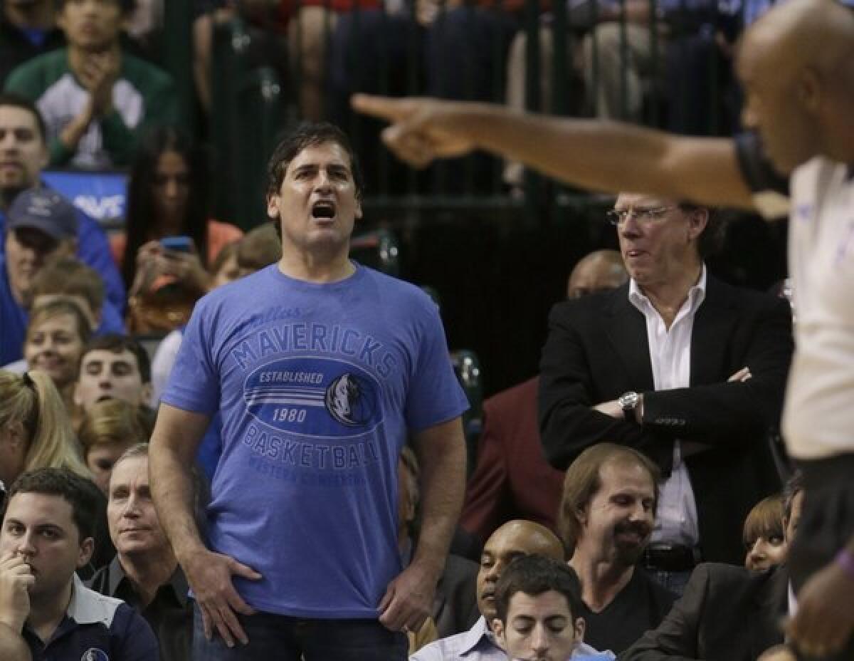 Mavericks owner Mark Cuban lets a referee know how he feels during a game.