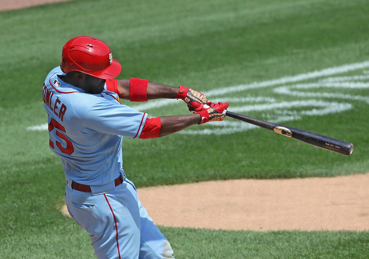 Cardinals outfielder Dexter Fowler swings a bat. Fowler is now signed with the Angels.