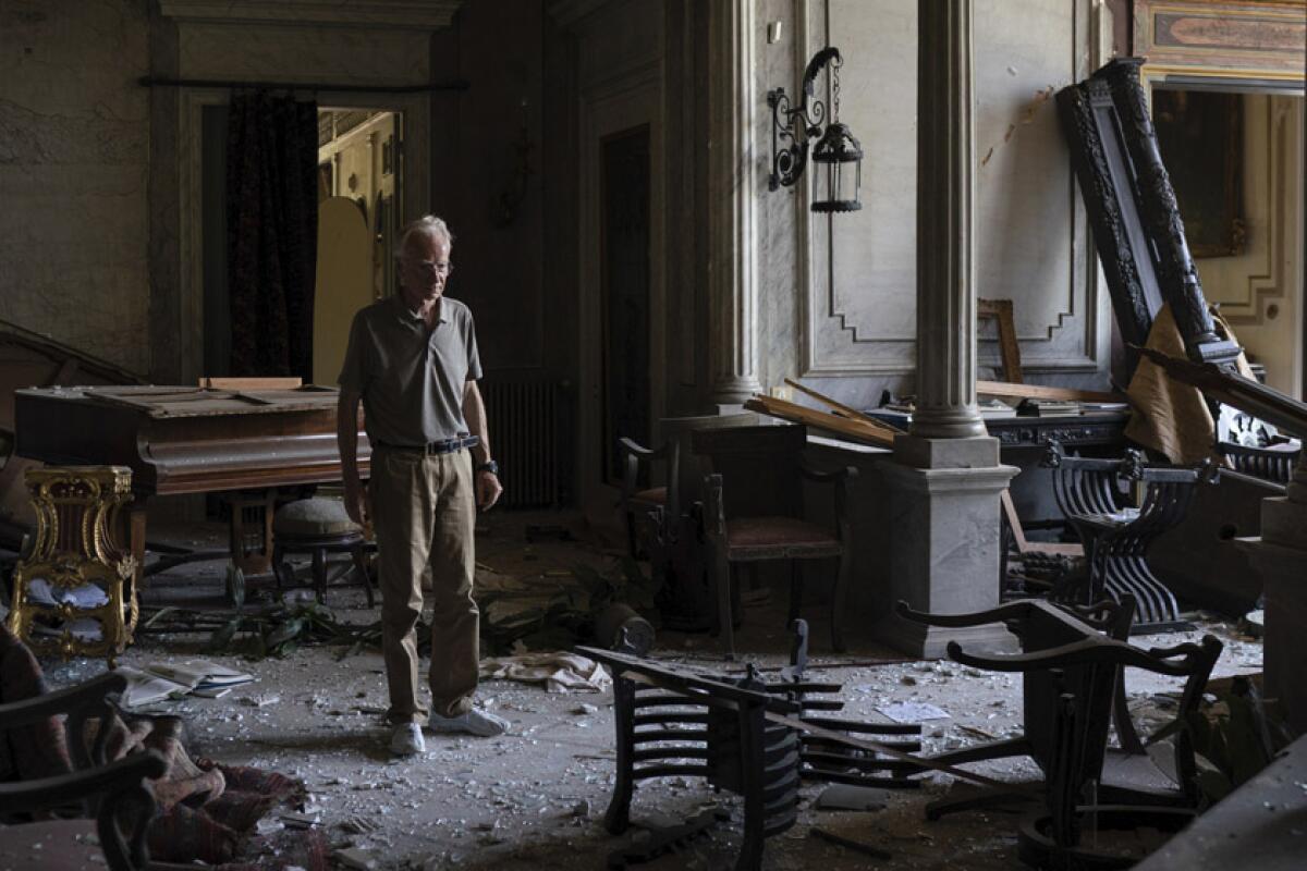 Roderick Sursock, owner of Beirut's Sursock Palace, in one of the damaged rooms.