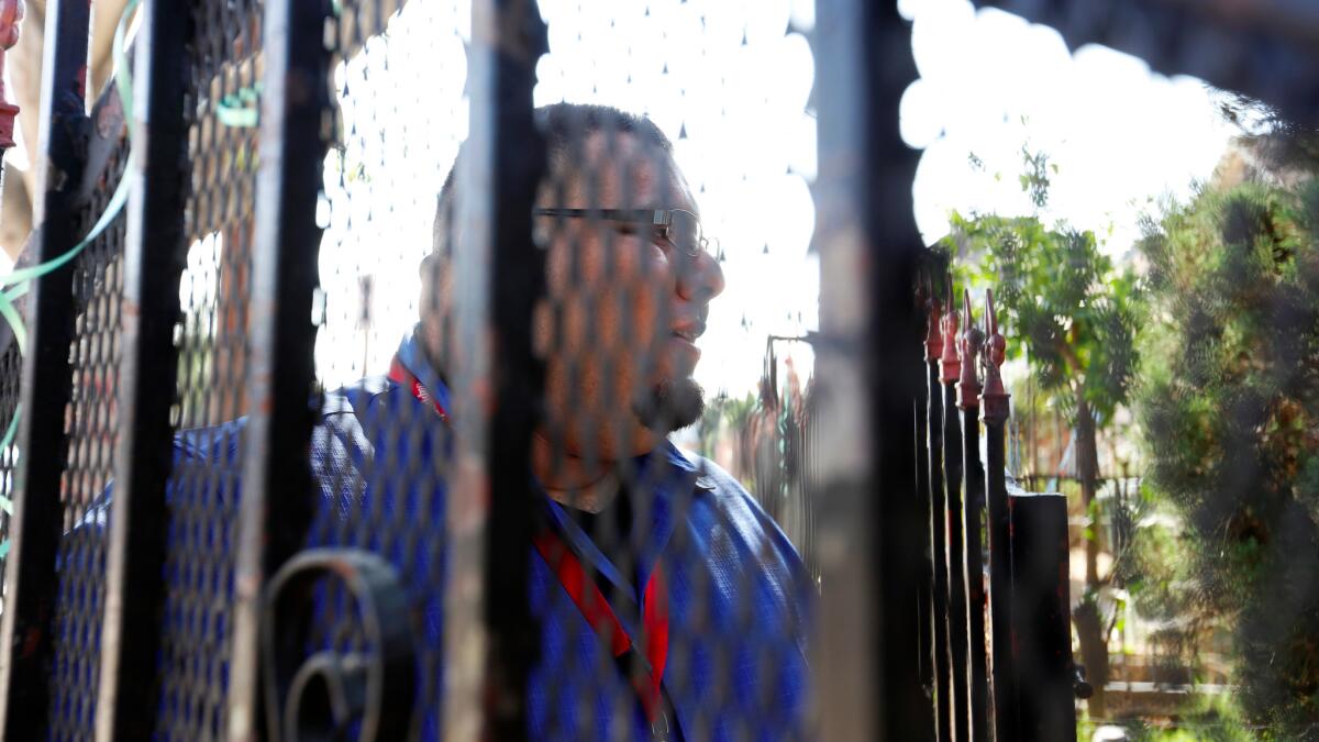 Jose Lara, Dean of Santee Education Complex, as he walks the South Los Angeles neighborhoods.