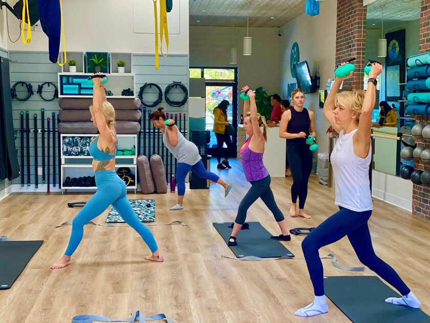 A group fitness class at MB Fit Studio.