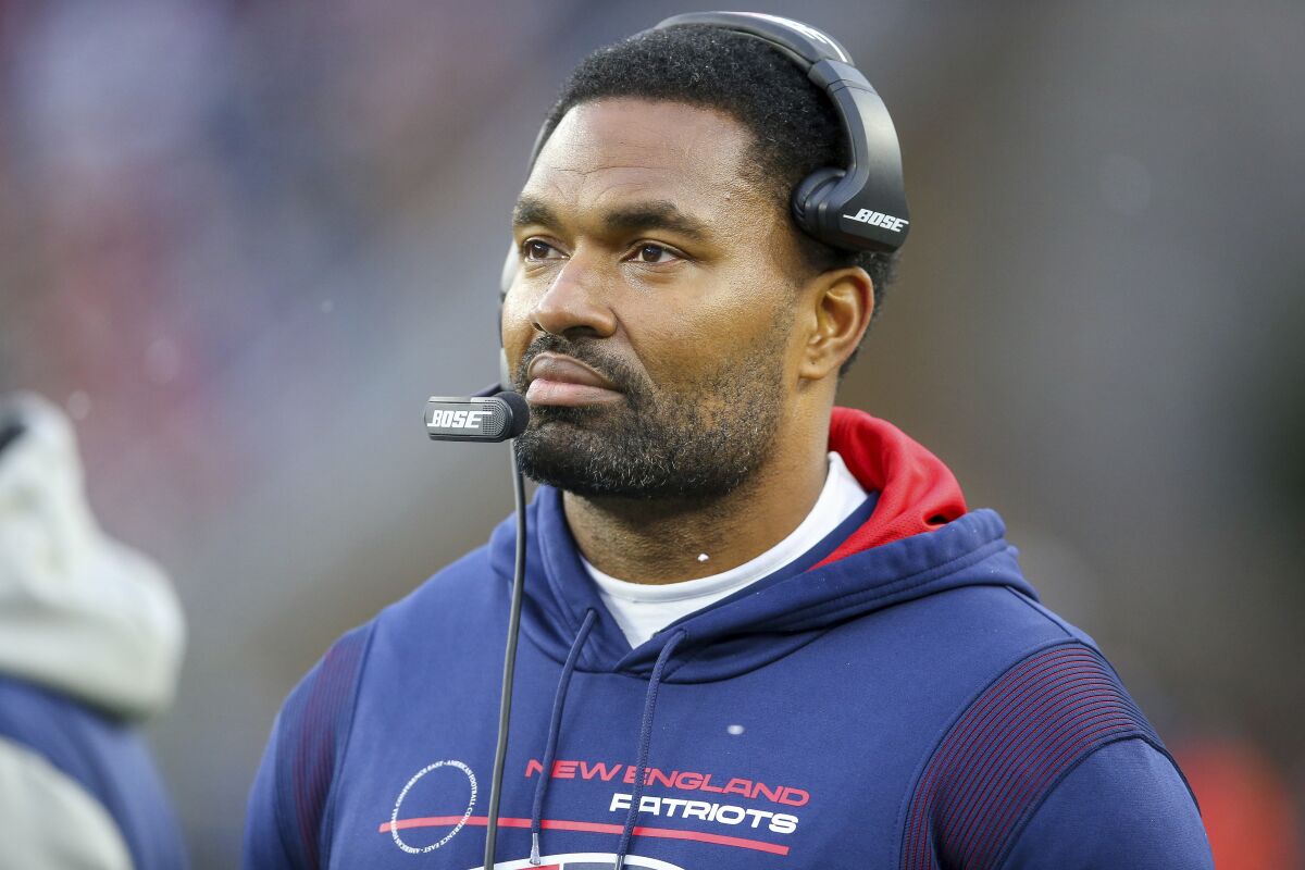 FILE - New England Patriots inside linebacker coach Jerod Mayo is shown on the sideline during the second half of an NFL football game against the Tennessee Titans, Sunday, Nov. 28, 2021, in Foxborough, Mass. The Patriots are one of the NFL’s most successful franchises, winning six Super Bowls. But they, like many NFL teams, have a less than impressive record when it comes to hiring minority assistant coaches. (AP Photo/Stew Milne, File)