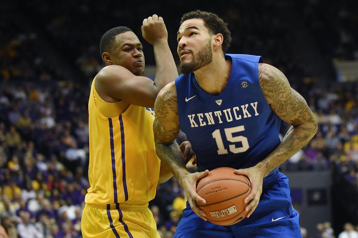 Kentucky center Willie Cauley-Stein powers his way to the basket against Louisiana State forward Jarell Martin during an SEC game on Feb. 10.