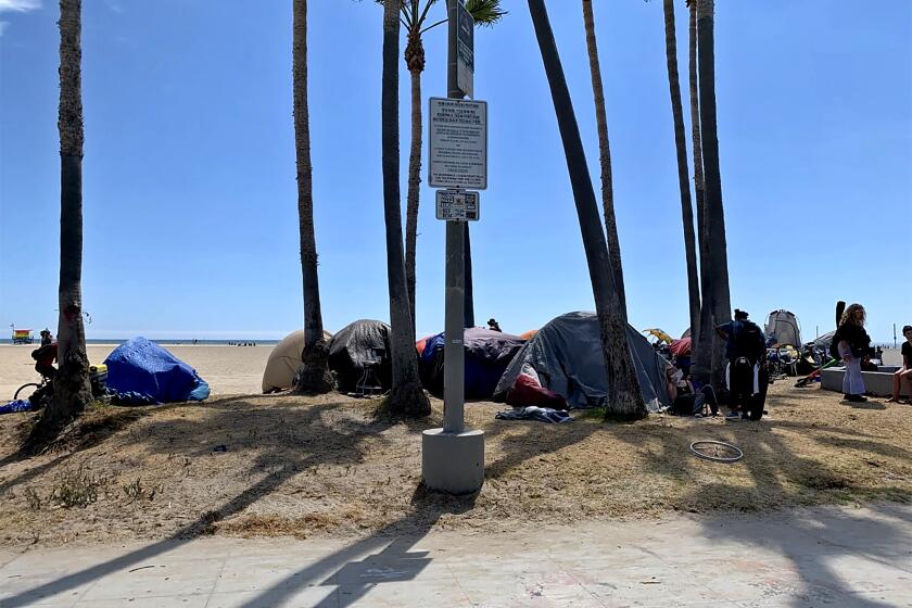 VENICE BEACH, CALIF. - JUNE 23, 2021 - Tents along boardwalk. (Carla Hall / Los Angeles Times)