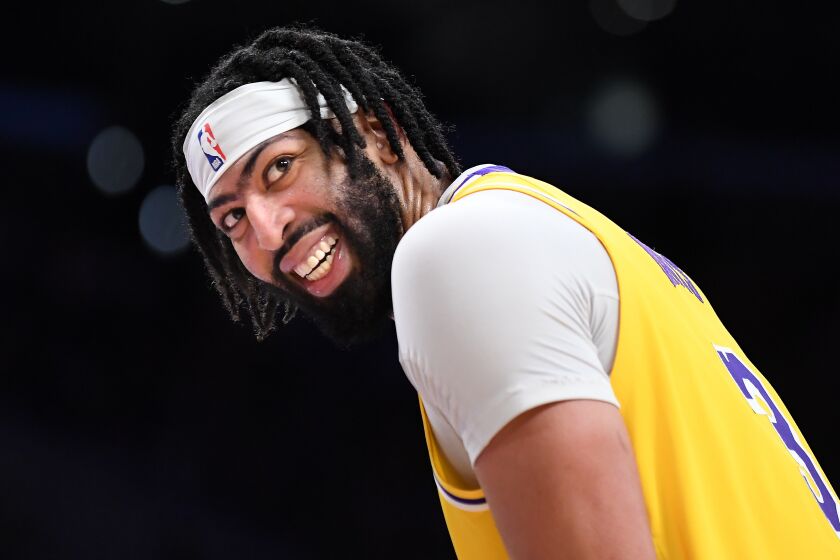 Los Angeles, California March 22, 2023-Lakers Anthony Davis smiles to the fans as his team.