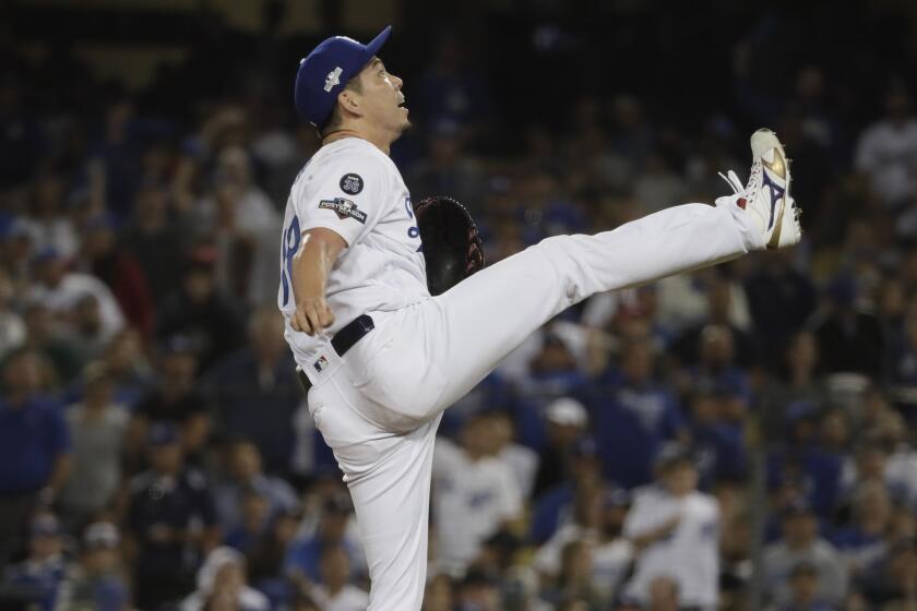 LOS ANGELES, CA, THURSDAY, OCTOBER 3, 2019 - Los Angeles Dodgers starting pitcher Kenta Maeda (18) reacts as a ball is popped up while pitching the seventh inning against the Washington Nationals in game one of the National League Division Series at Dodger Stadium. (Robert Gauthier/Los Angeles Times)