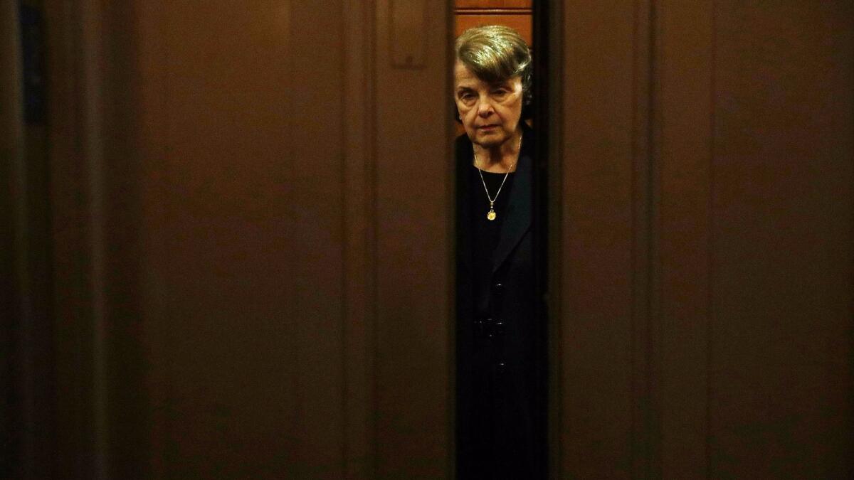 Sen. Dianne Feinstein (D-CA) leaves the Senate chamber after a vote at the Capitol in Washington on Dec. 1.