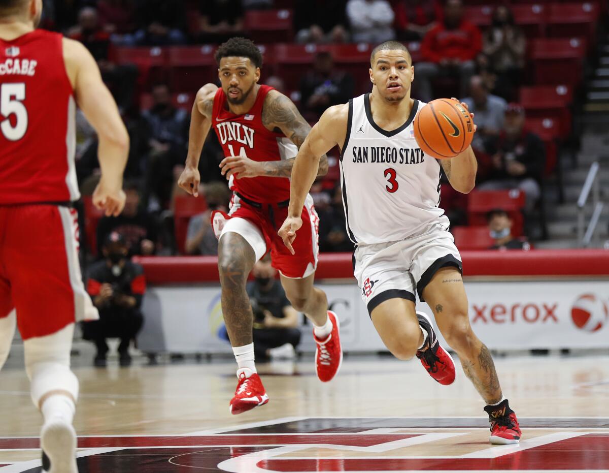 San Diego State's Matt Bradley drives Monday night against UNLV at Viejas Arena. Bradley led all scorers with 27 points.