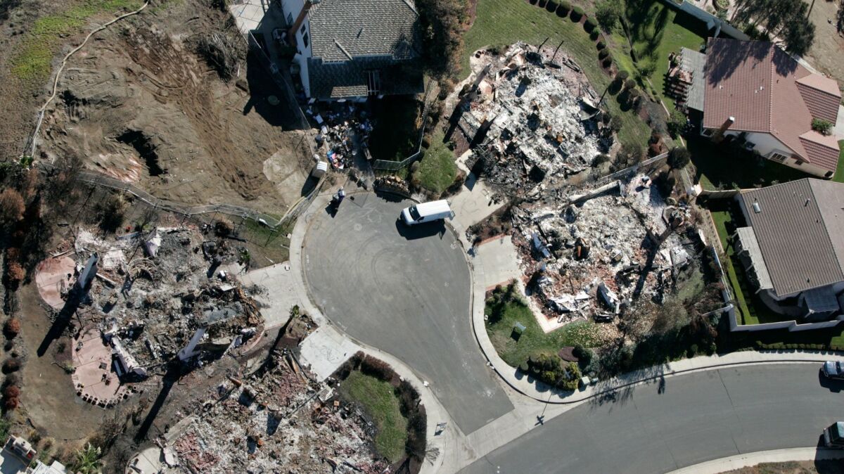 The 2007 Witch Fire destroyed five of the six homes on this Rancho Bernardo cul-de-sac. San Diego Gas and Electric says ratepayers should cover most of the fire's cost.