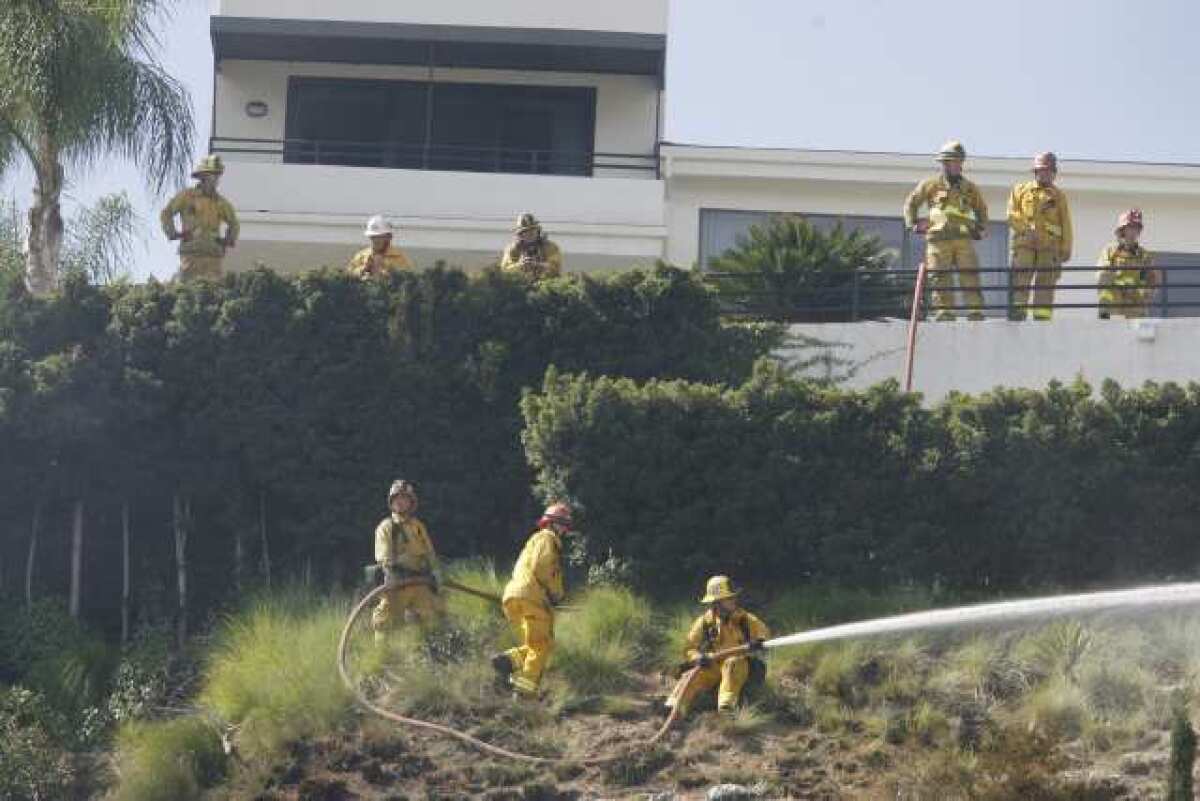 Glendale firefighters put out a small grass fire at the 1900 block of Deermont Road in Glendale.