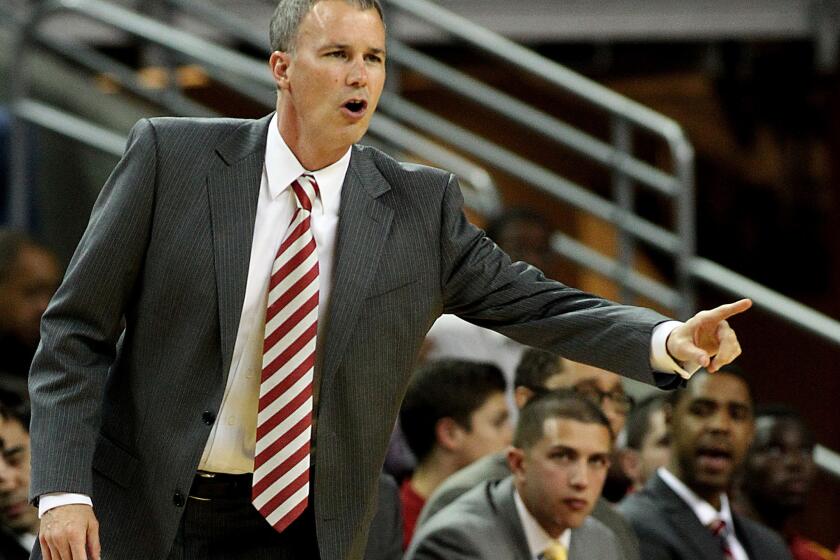 USC Coach Andy Enfield's Trojans basketball team has a record of 15-3 and are 4-1 in Pac-12 Conference play this season.