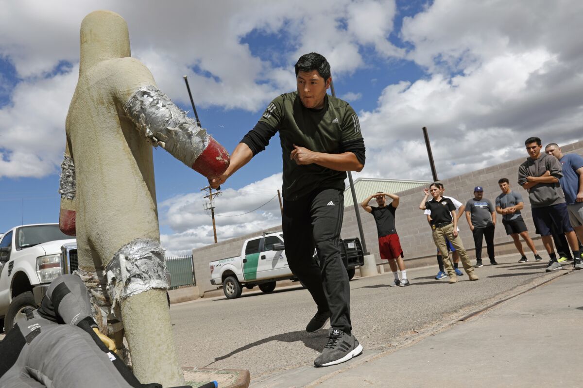 Trainee Jose Avalos learns defensive tactics in the El Centro Sector's Border Patrol citizens' academy.